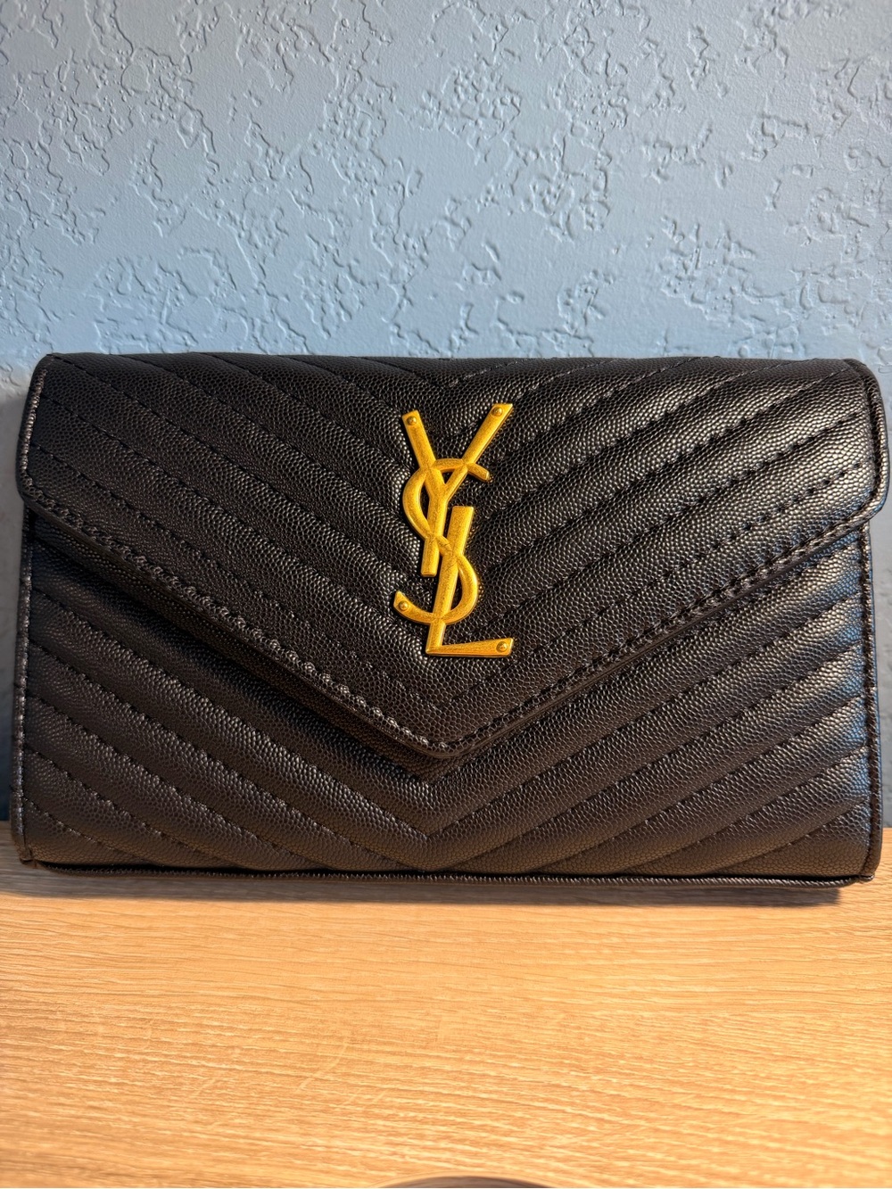 Saint Laurent Black Leather Bag with Gold YSL Logo